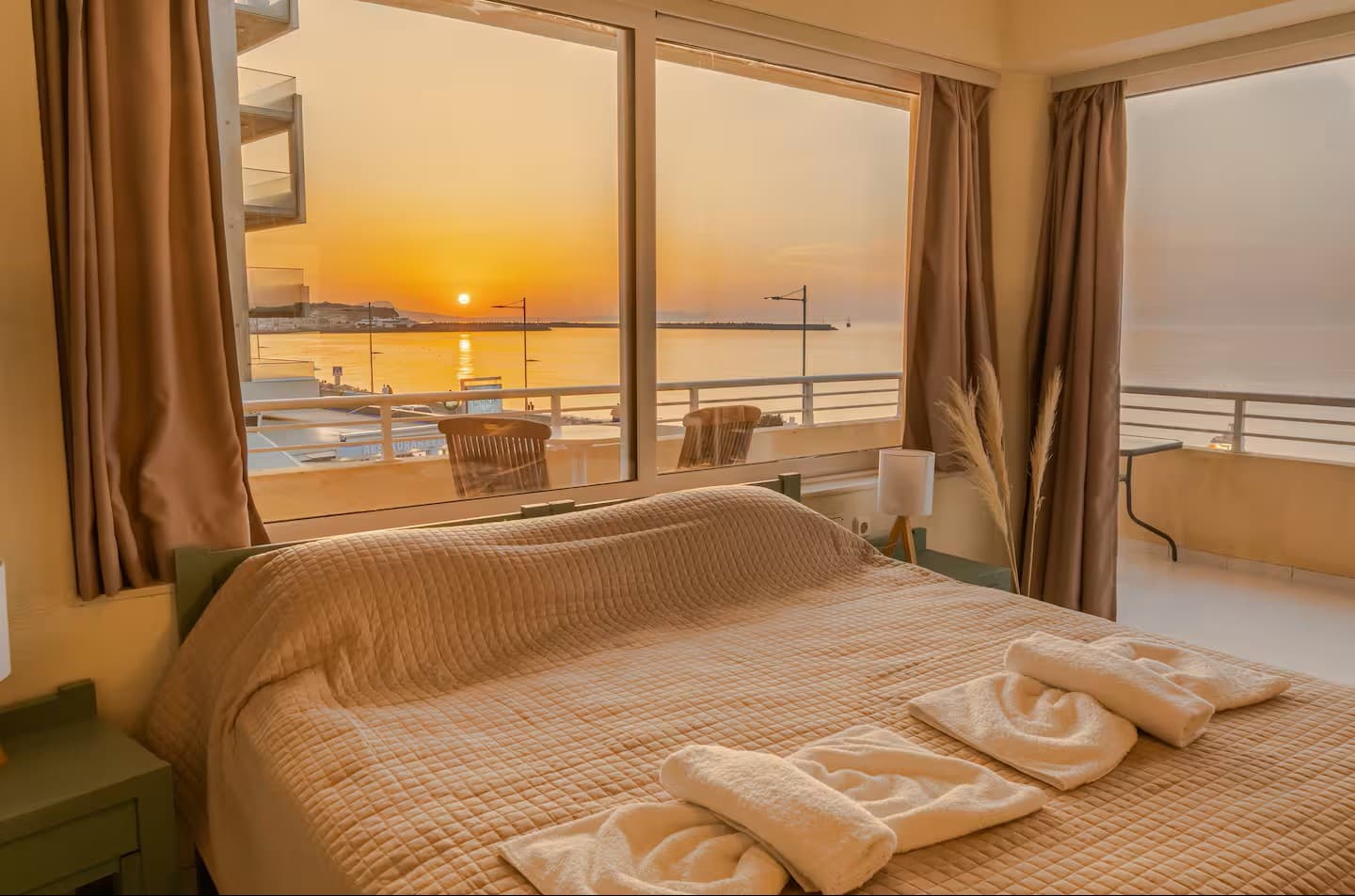 The bedroom, made up with white linen
