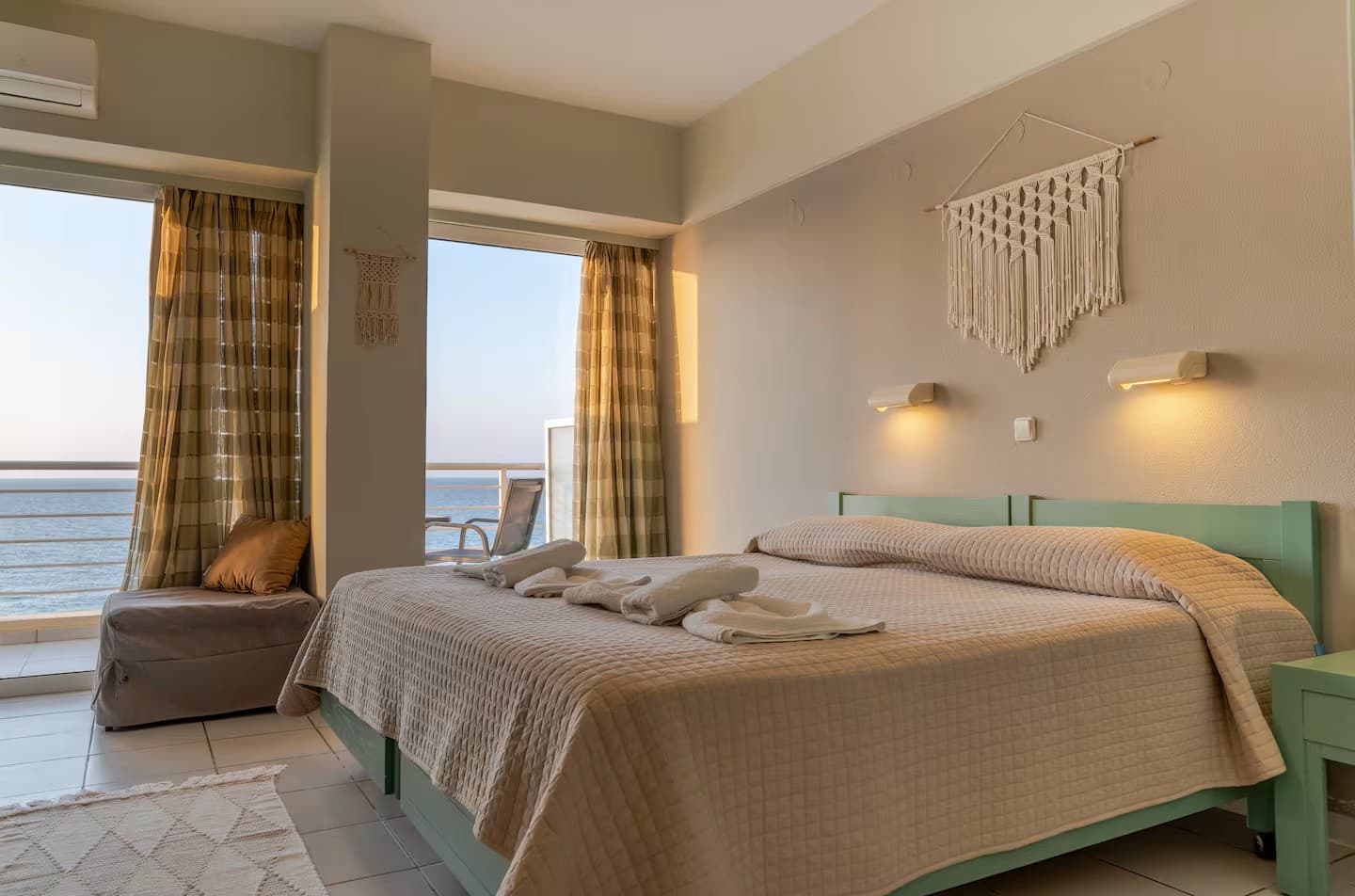 The bedroom, made up with white linen